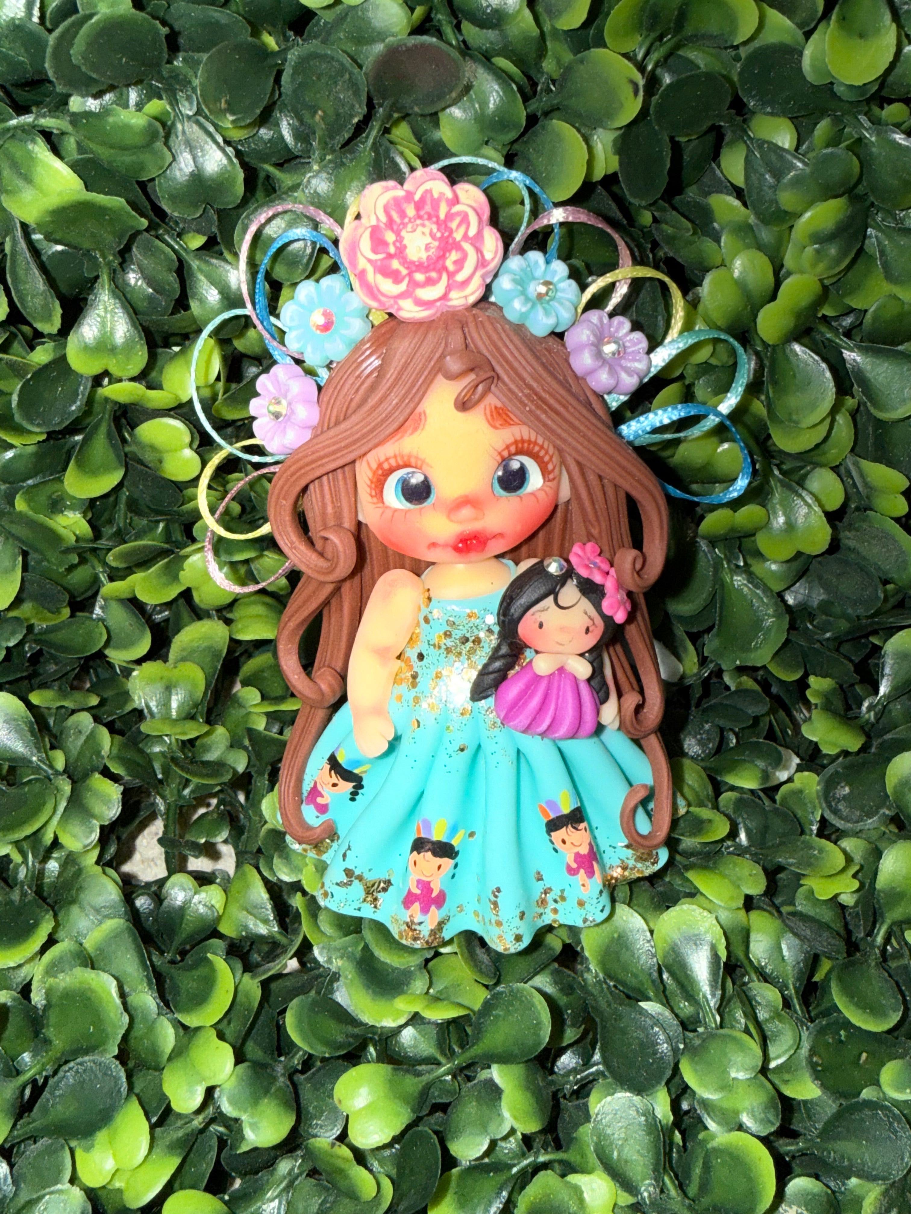 Teal Girl with doll